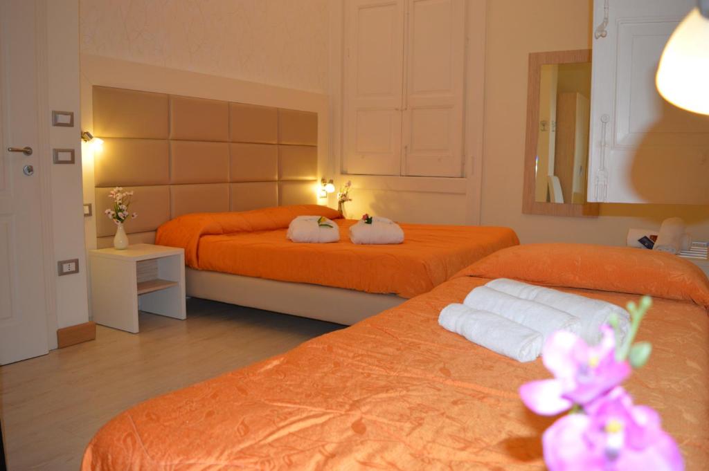 Posteľ alebo postele v izbe v ubytovaní Villa Vittoria Tropea B&B