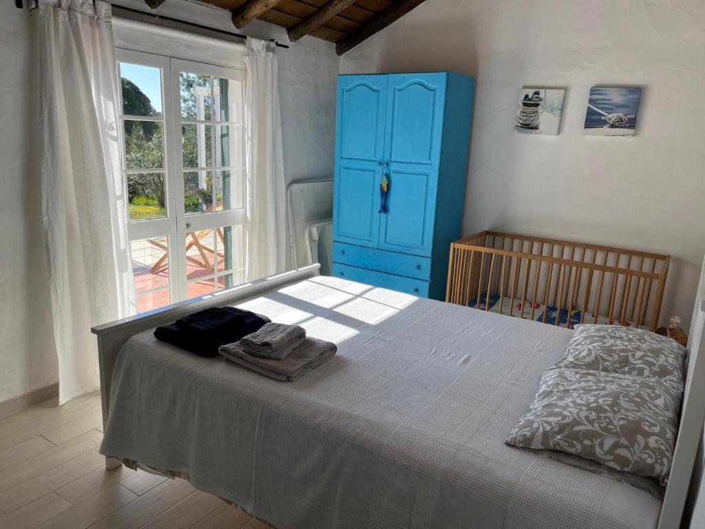 Postel nebo postele na pokoji v ubytování Villa Monte dos Pinheiros