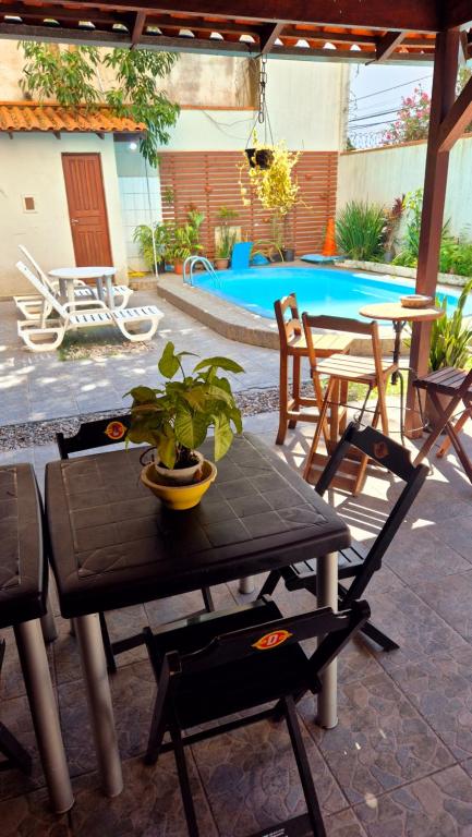 Bazén v ubytování Suites com piscina nebo v jeho okolí