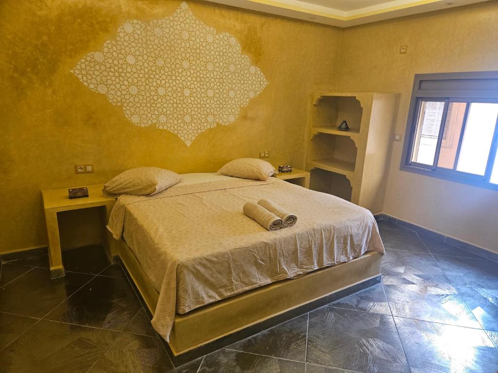 Postel nebo postele na pokoji v ubytování Les jardins berbères d'Agadir