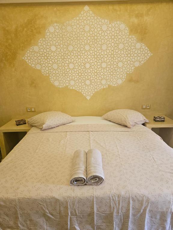 Postel nebo postele na pokoji v ubytování Les jardins berbères d'Agadir