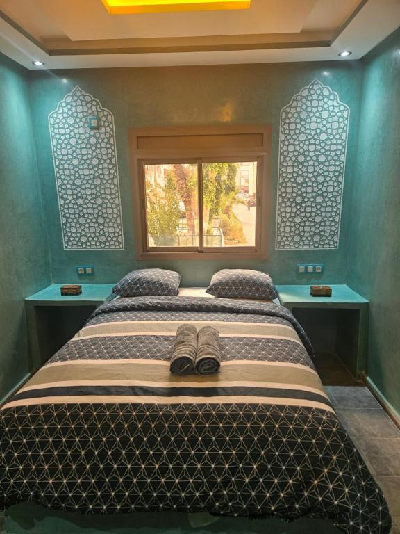 Postel nebo postele na pokoji v ubytování Les jardins berbères d'Agadir
