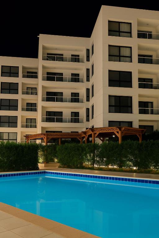 The swimming pool at or close to Seaside Serenity - Family Chalet with Modern Comforts