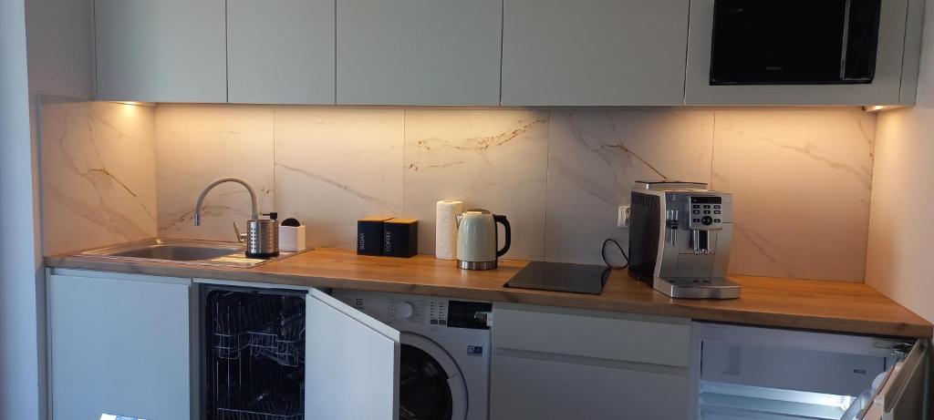 Kuchyňa alebo kuchynka v ubytovaní Apartament Koszałka