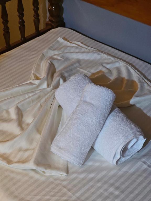 Postel nebo postele na pokoji v ubytování Hani i Ilirit