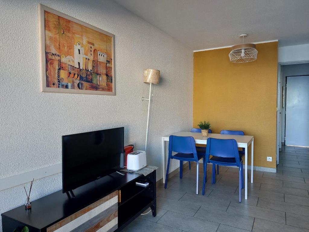 Televízia a/alebo spoločenská miestnosť v ubytovaní CASA MORENA - vue mer