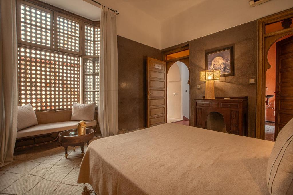 Postel nebo postele na pokoji v ubytování Riad Tassili Marrakech