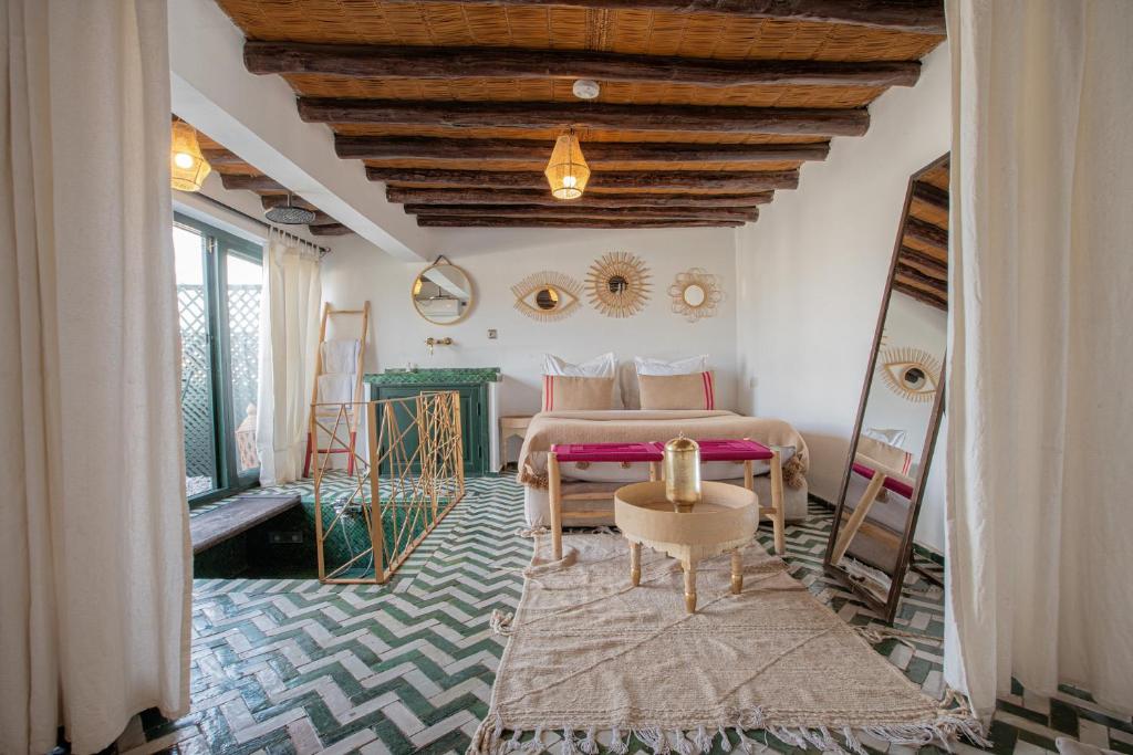 Postel nebo postele na pokoji v ubytování Riad Tassili Marrakech