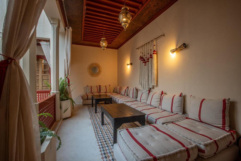 Postel nebo postele na pokoji v ubytování Riad Tassili Marrakech