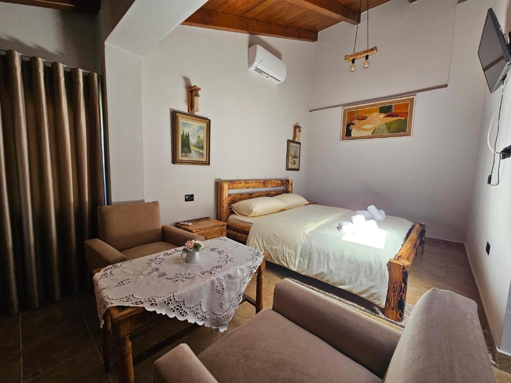 Postel nebo postele na pokoji v ubytování Hani i Ilirit