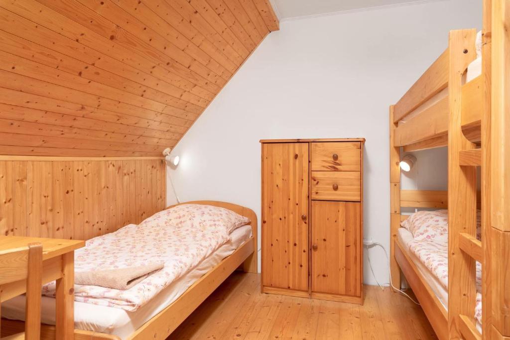 Postel nebo postele na pokoji v ubytování Penzion ZOE