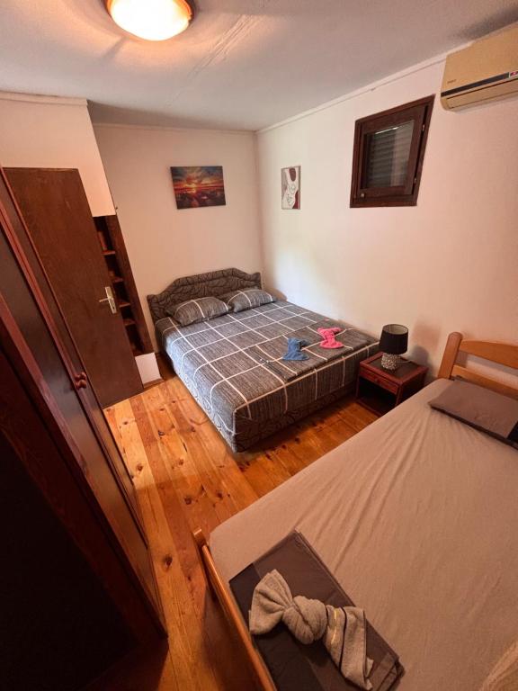 Postel nebo postele na pokoji v ubytování Vikendica Nina
