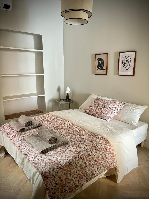 Postel nebo postele na pokoji v ubytování Appartement Bastia centre ancien