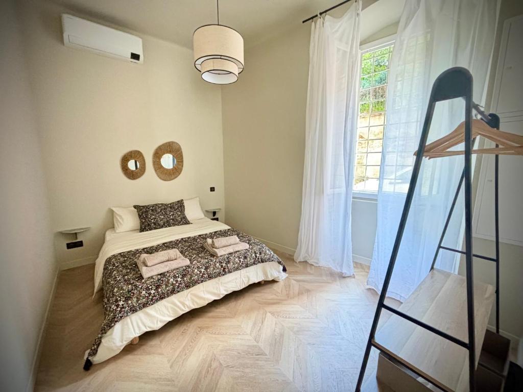 Postel nebo postele na pokoji v ubytování Appartement Bastia centre ancien