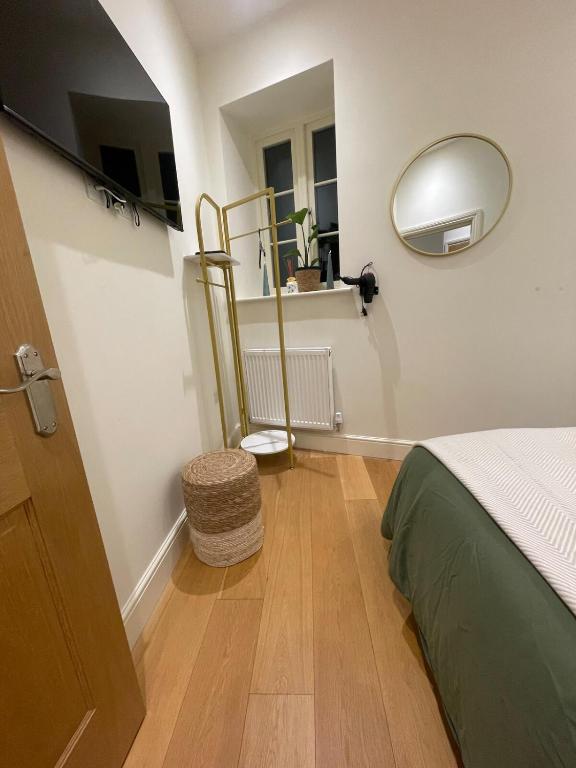 Postel nebo postele na pokoji v ubytování Boho Bliss in Towcester