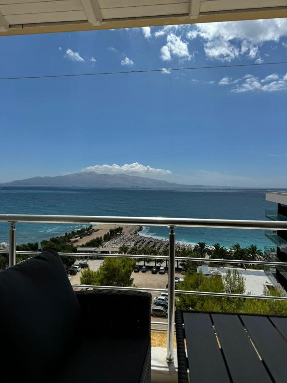 a view of the ocean from the balcony of a condo at Michal's Apartment in Sarandë
