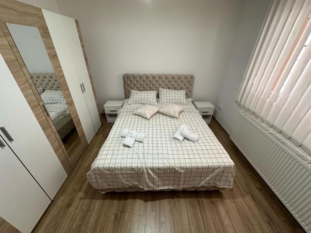 Postel nebo postele na pokoji v ubytování Apartman Djuric