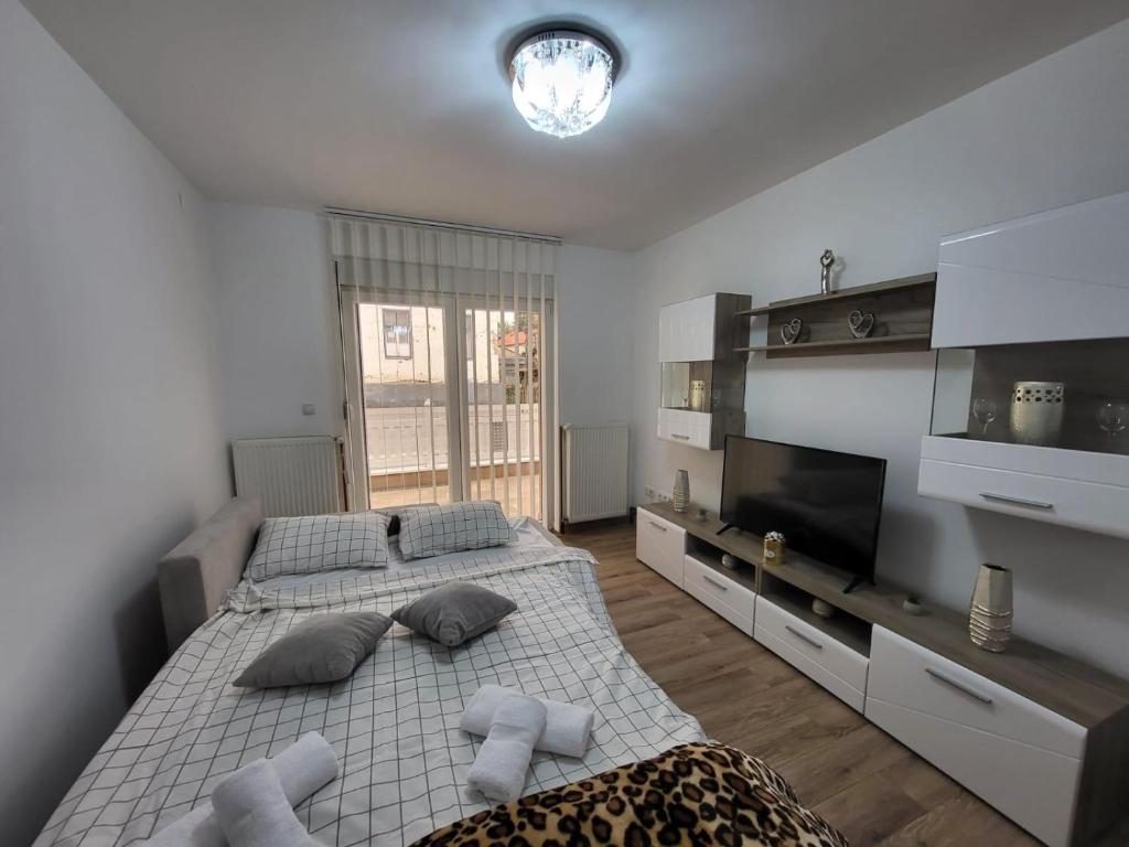 Postel nebo postele na pokoji v ubytování Apartman Djuric