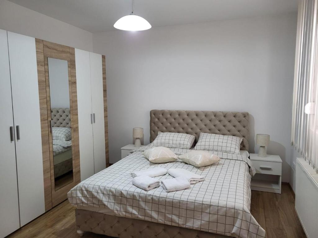 Postel nebo postele na pokoji v ubytování Apartman Djuric