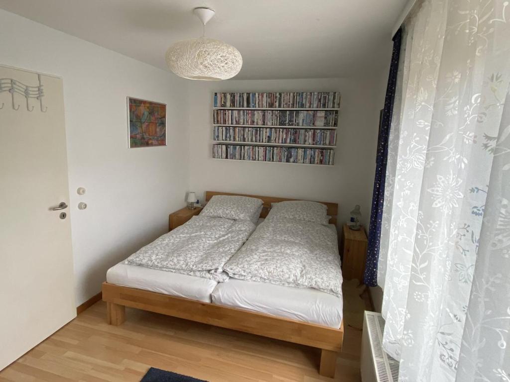 Postel nebo postele na pokoji v ubytování Die Kleine Heidevilla