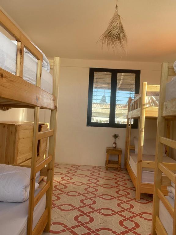 Postel nebo postele na pokoji v ubytování Epicswellhouse