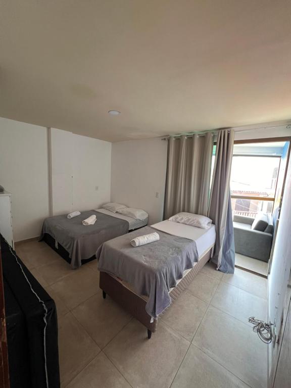 Postel nebo postele na pokoji v ubytování Apartamento para até 6 pessoas - Orla da Praia Grande