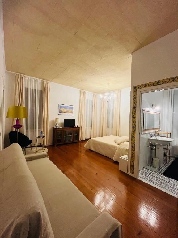 Postel nebo postele na pokoji v ubytování Villa Bignago B&B