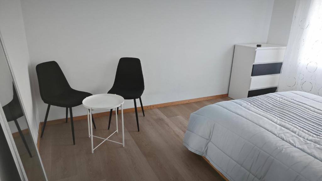 Postel nebo postele na pokoji v ubytování chambre enjoyed
