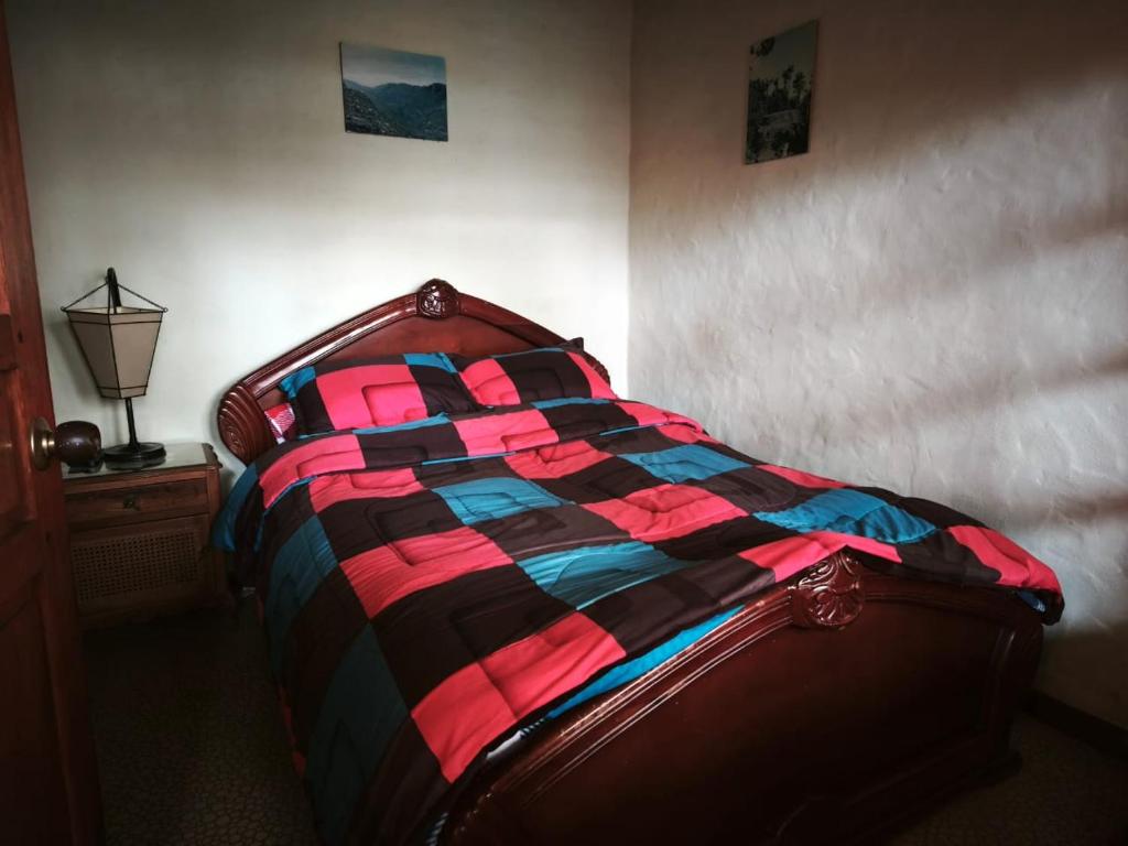 Postel nebo postele na pokoji v ubytování Cabañas rurales Mano de Oso Guasca