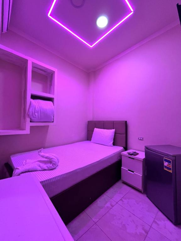 Postel nebo postele na pokoji v ubytování Abdeen Cairo Hostel