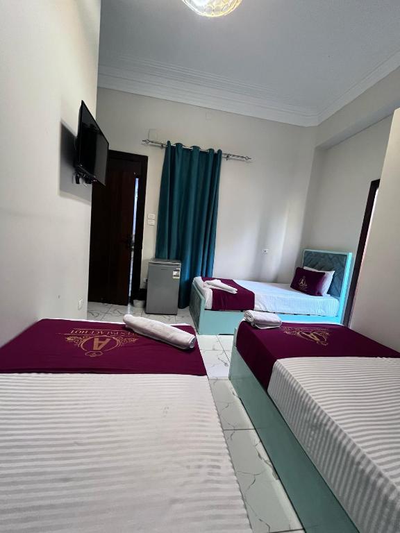 Postel nebo postele na pokoji v ubytování Abdeen Cairo Hostel