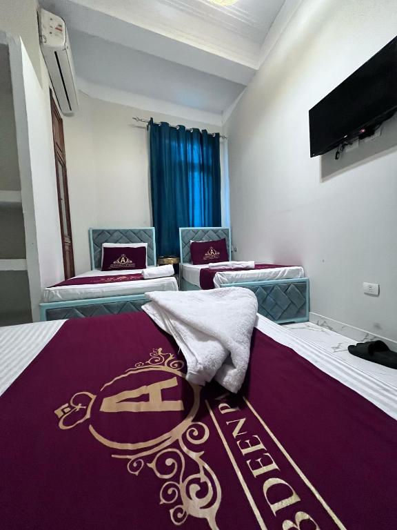 Postel nebo postele na pokoji v ubytování Abdeen Cairo Hostel