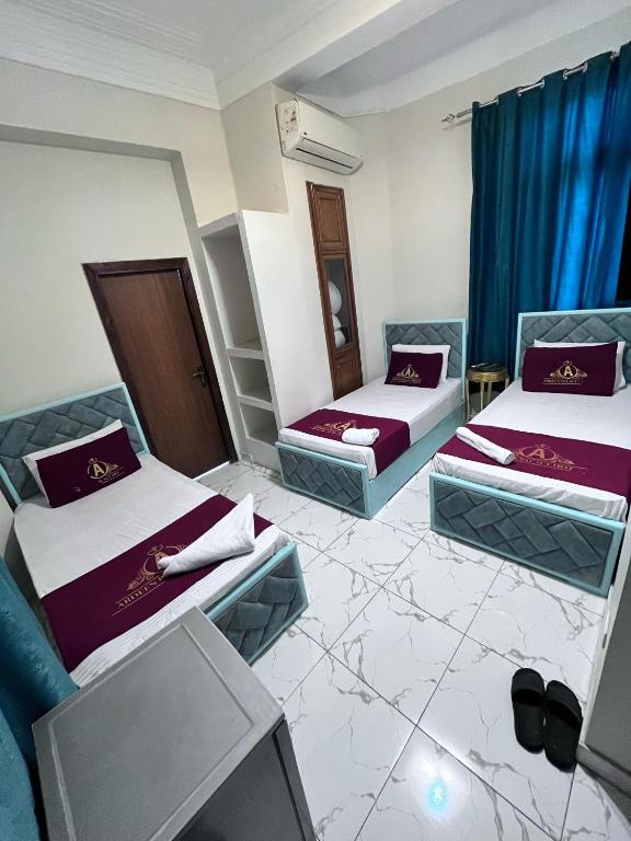 Postel nebo postele na pokoji v ubytování Abdeen Cairo Hostel