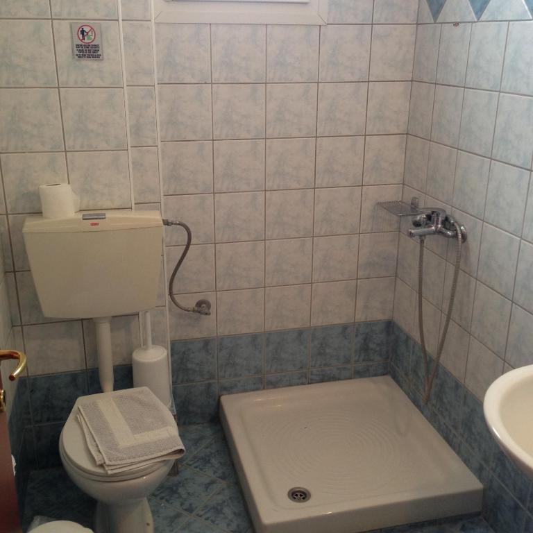 Koupelna v ubytování Hotel Akrogiali