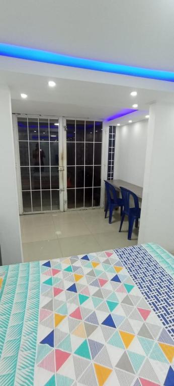 Postel nebo postele na pokoji v ubytování HABITACION ENTRADA INDEPENDIENTE - Aire Acondicionado