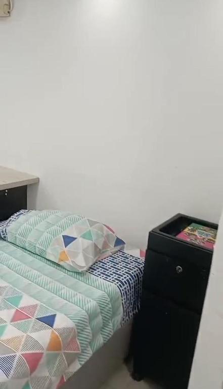 Postel nebo postele na pokoji v ubytování HABITACION ENTRADA INDEPENDIENTE - Aire Acondicionado