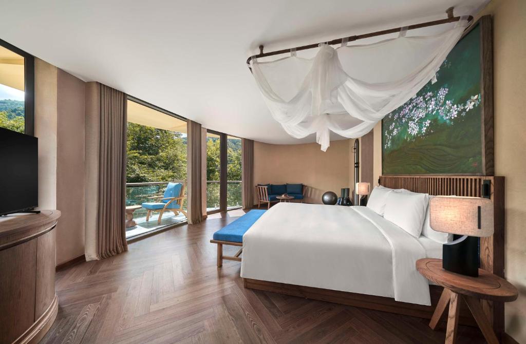 Giường trong phòng chung tại Garrya Mù Cang Chải