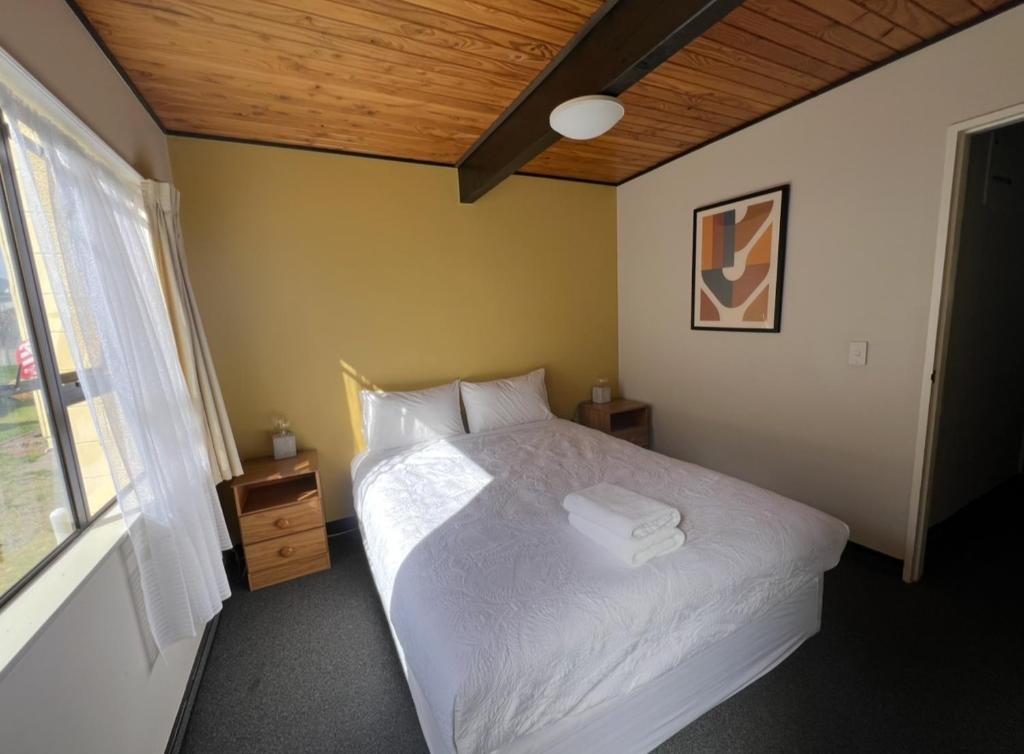 Postel nebo postele na pokoji v ubytování Mountain View Motel