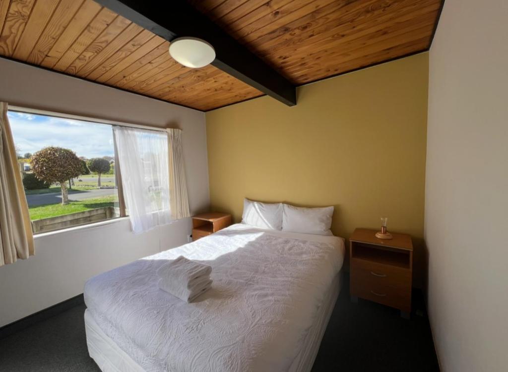 Postel nebo postele na pokoji v ubytování Mountain View Motel