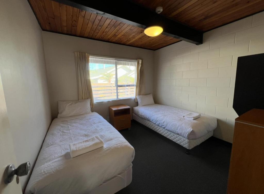 Postel nebo postele na pokoji v ubytování Mountain View Motel