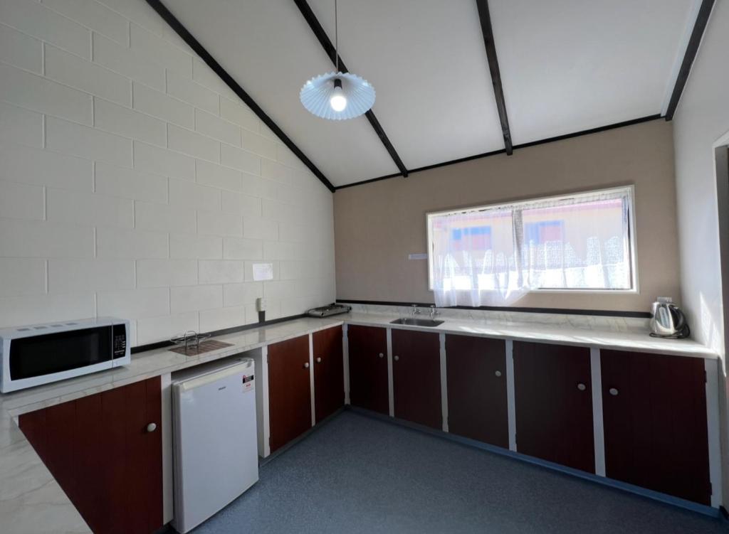 Kuchyň nebo kuchyňský kout v ubytování Mountain View Motel
