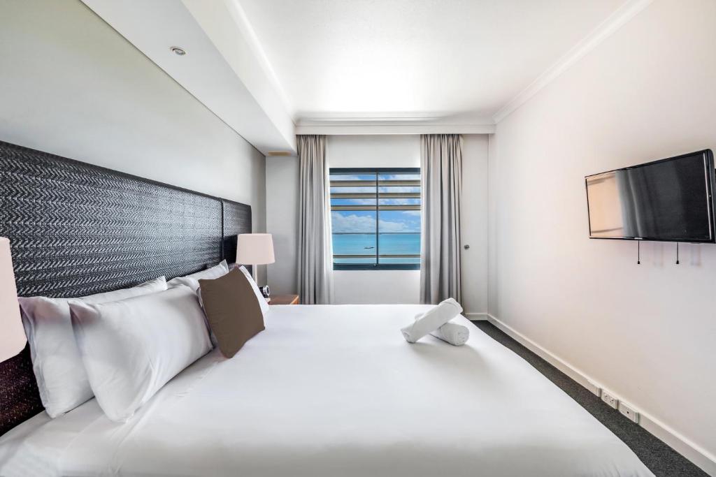 Gulta vai gultas numurā naktsmītnē Two Private Oceanview Suites with Resort Pool