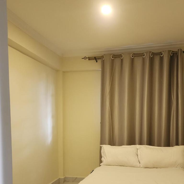 Postel nebo postele na pokoji v ubytování Cozy 4 Bedroom Holiday Home