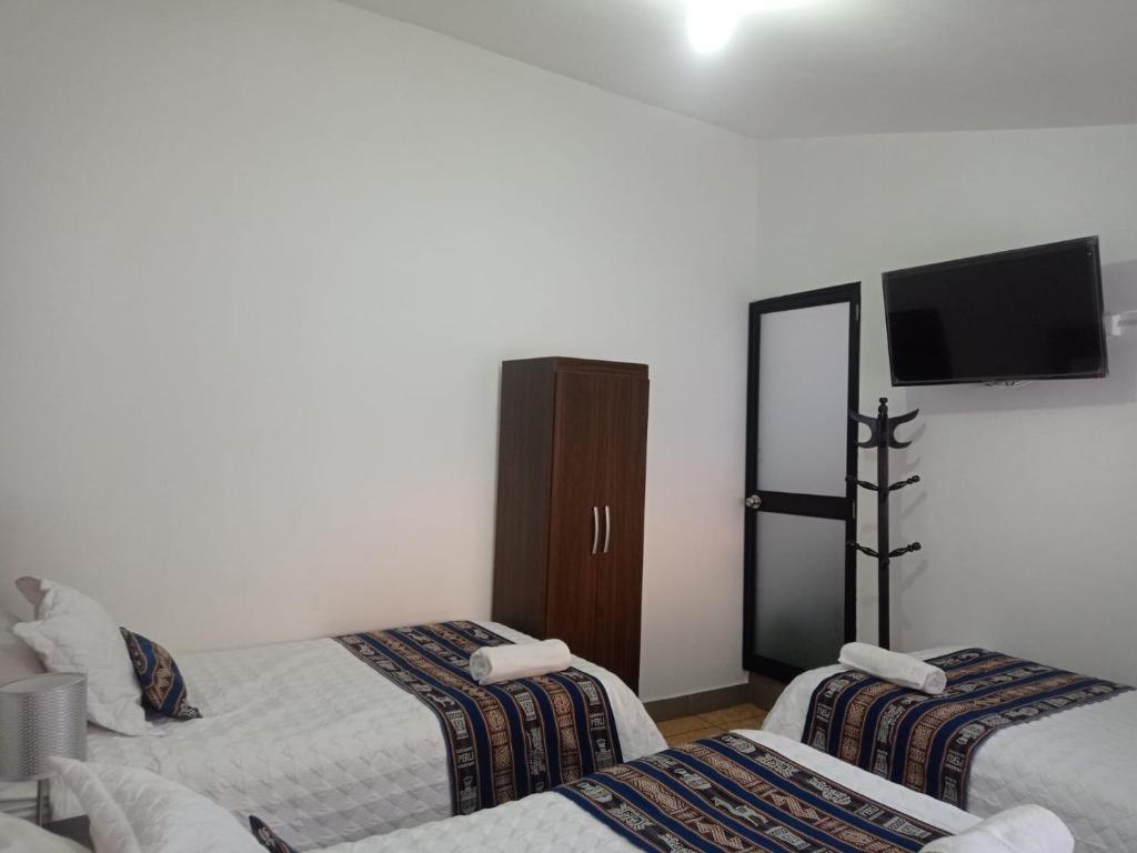 Postel nebo postele na pokoji v ubytování Hs Charlie