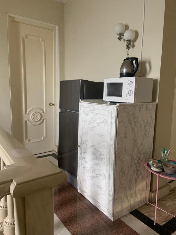 Kuchyň nebo kuchyňský kout v ubytování Guest House Lilia