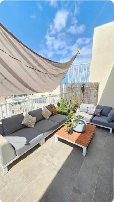 Posezení v ubytování Sole di Malta Panoramic view Penthouse