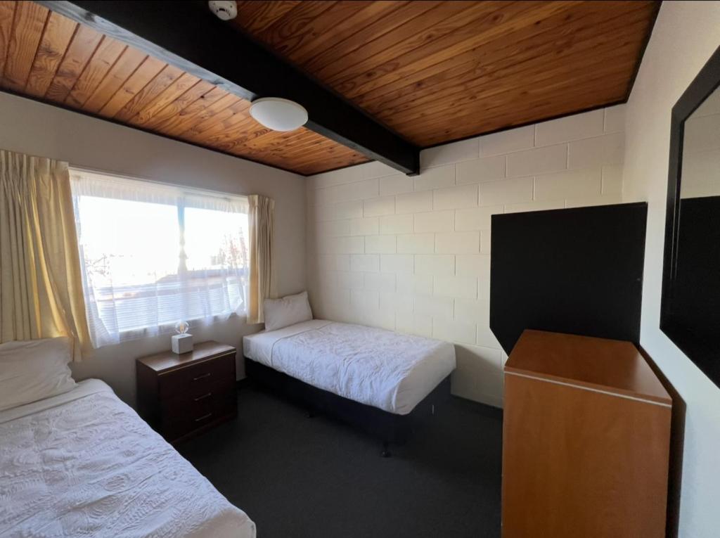 Postel nebo postele na pokoji v ubytování Mountain View Motel
