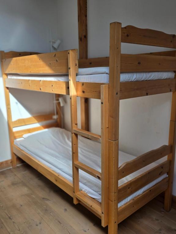 Postel nebo postele na pokoji v ubytování Siaröfortet