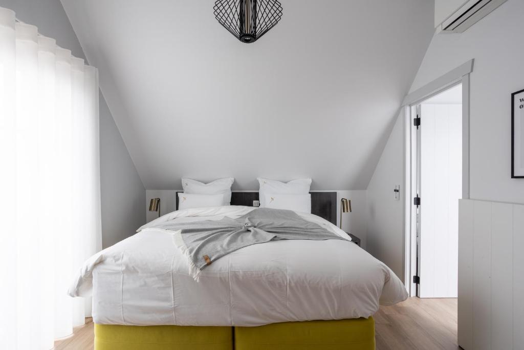 Postel nebo postele na pokoji v ubytování B&B Sasput