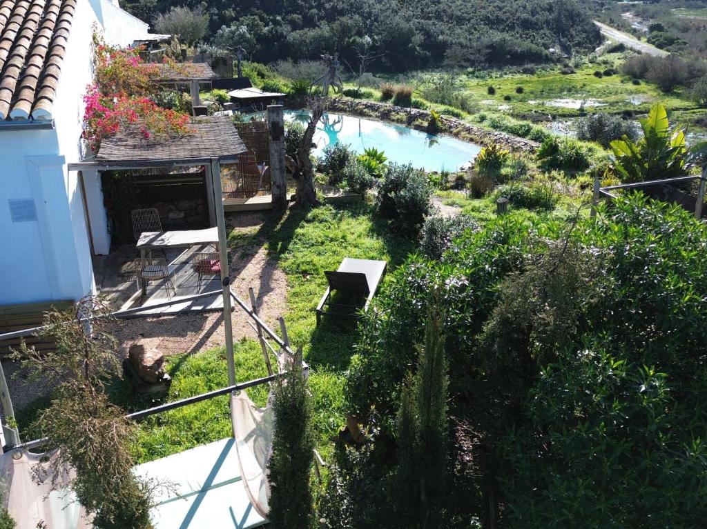 an aerial view of a house with a swimming pool at Vale D Sancho Eco Turismo in Aljezur